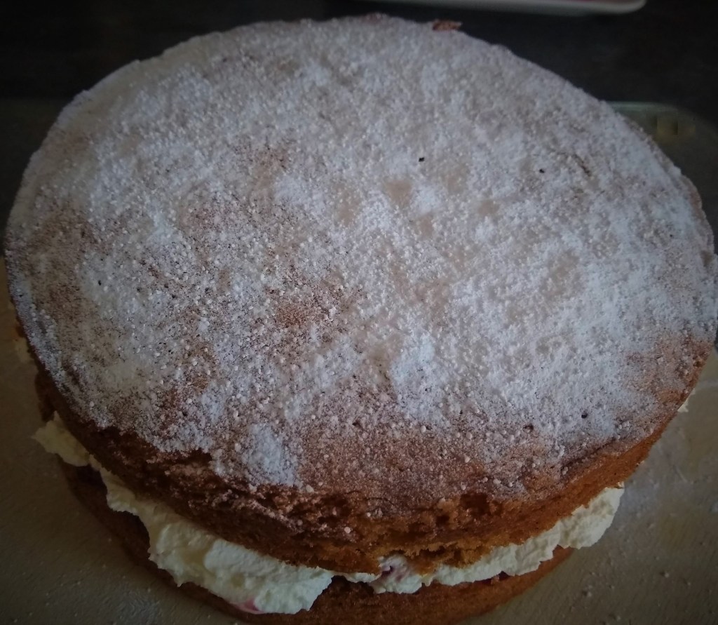 Victoria Sponge with a cream and jam filling